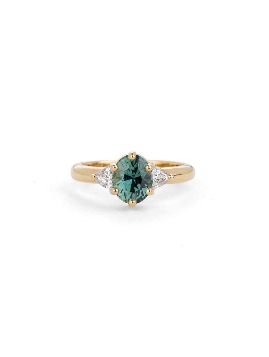 Teal Oval Sapphire And Trillion Diamond Trilogy Ring