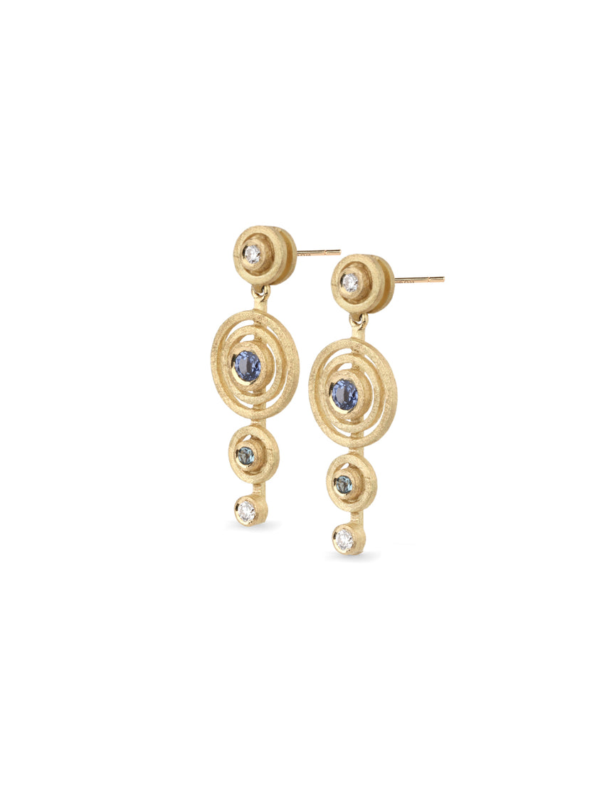 Drop earrings with concentric circular detail, set with blue sapphire, green beryl and white diamond. Textured 18ct yellow gold. Side view.