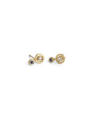 Ear studs with circular detail set with blue sapphires and white diamond. 