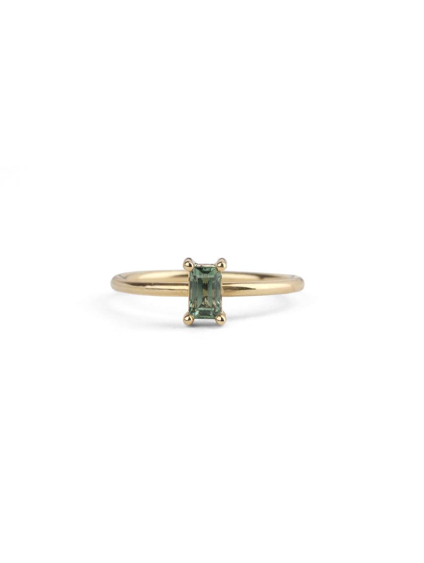 Rectangular green sapphire ring, four claw setting. 18ct yellow gold, polished finish.