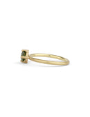 Solitaire ring in 18ct yellow gold with a round green sapphire, side view