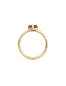 Solitaire ring in 18ct yellow gold with a round green sapphire, side view