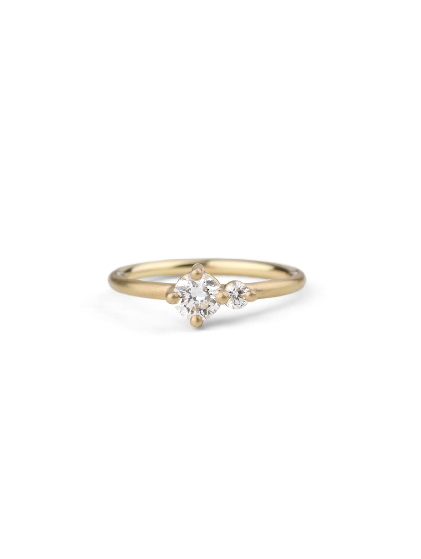 Two stone diamond ring. 18ct yellow gold, satin finish.