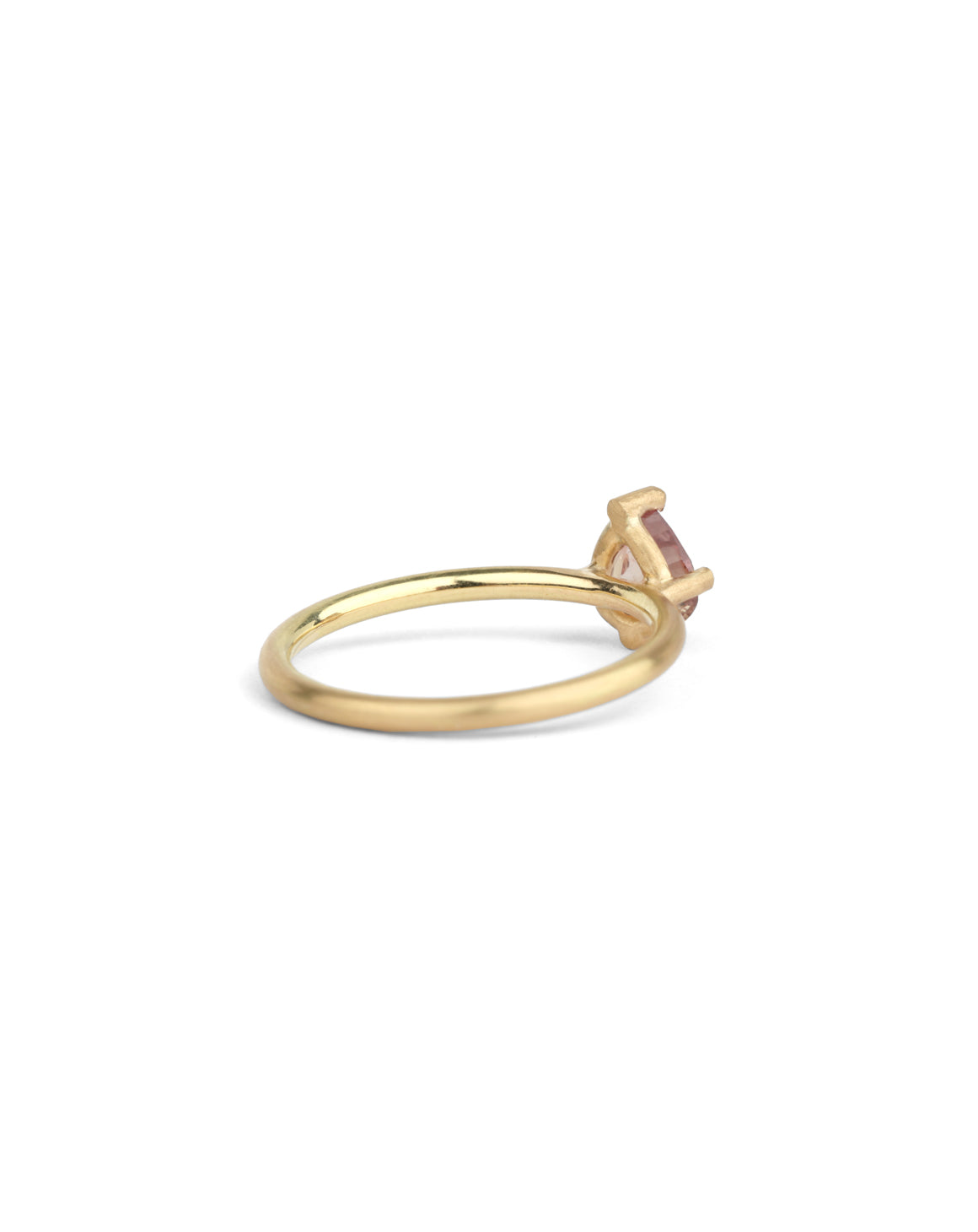 Solitaire ring in satin 18ct yellow gold with a drop shape light warm brown sapphire, back view