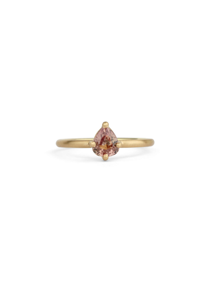 Solitaire ring in satin 18ct yellow gold with a drop shape light warm brown sapphire