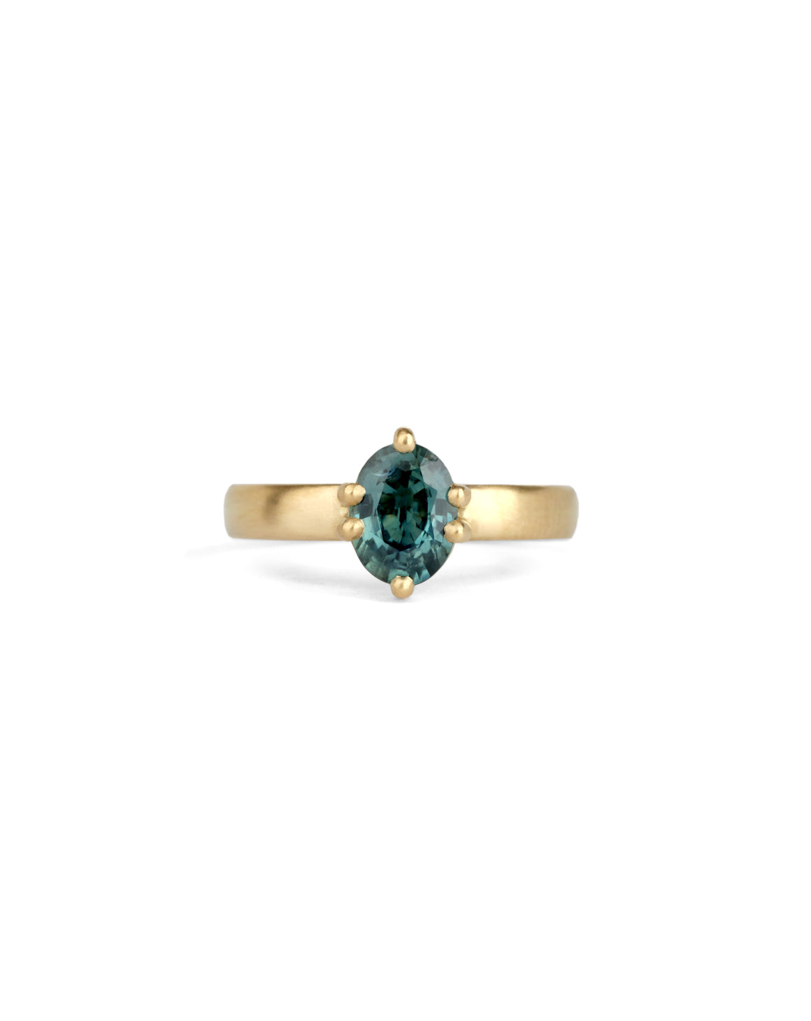 Solitaire ring in satin 18ct yellow gold with an oval teal sapphire