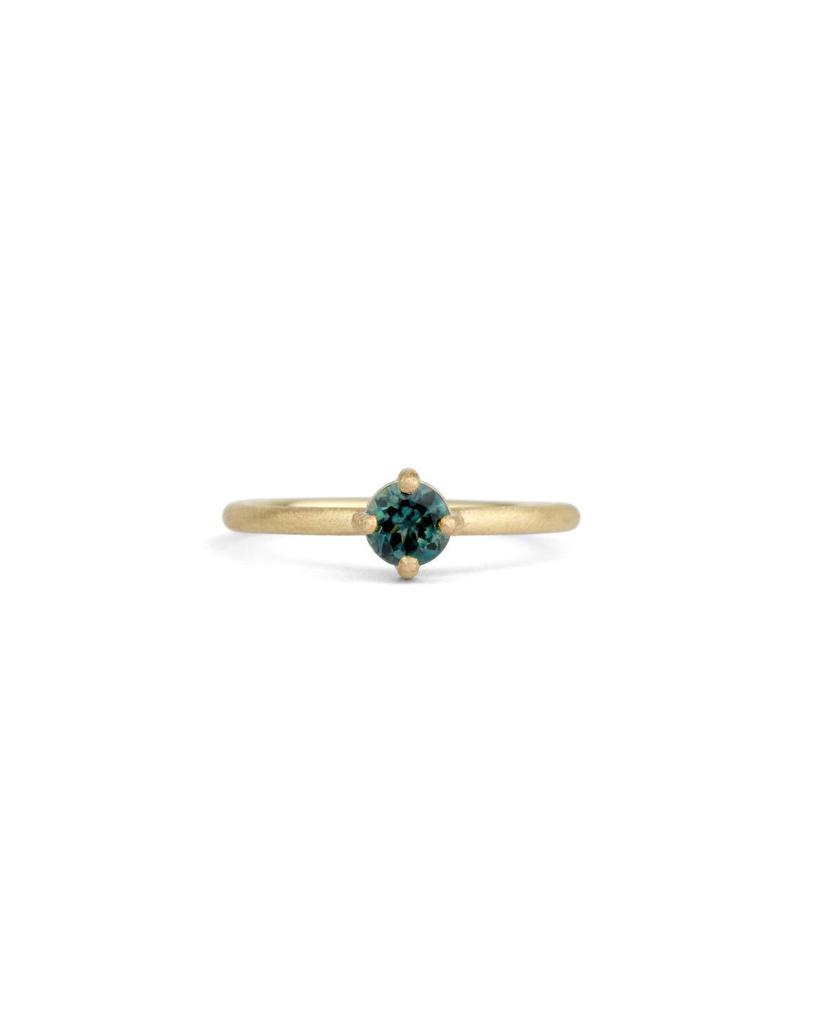 Solitaire ring in textured 18ct yellow gold with a round teal sapphire