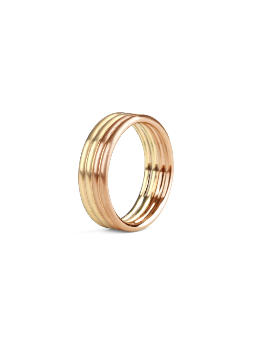 Wedding ring, four joined bands. 18ct yellow and rose gold, satin finish.