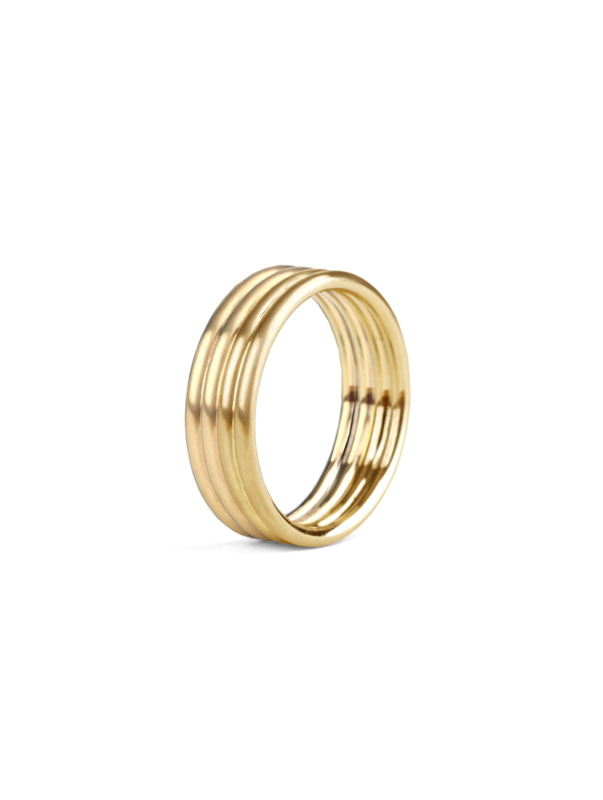 Wedding ring, four joined bands. 18ct yellow gold, satin finish.