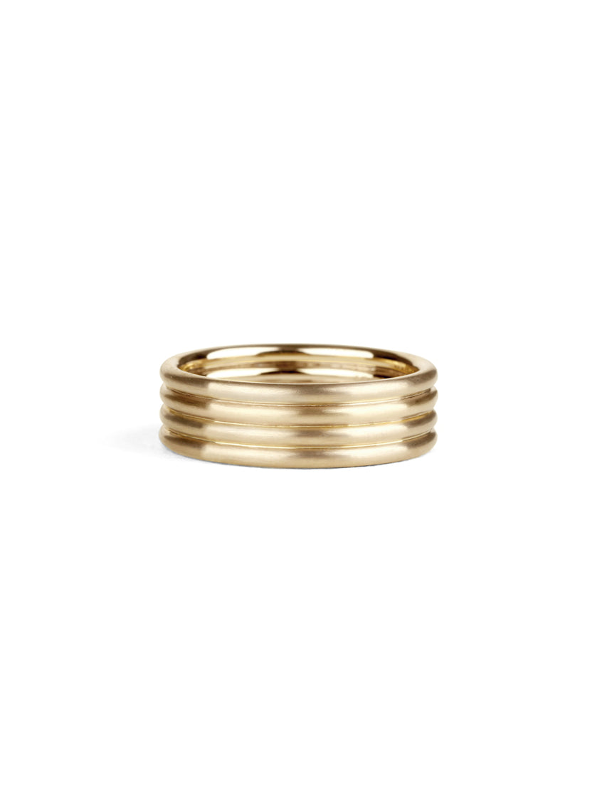 Wedding ring, four joined bands. 18ct yellow gold, satin finish.